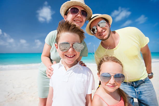 istock Family on a tropical beach vacation 186914036