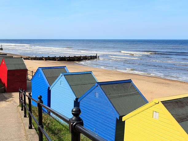 istock Mundesley Beach Huts Norfolk England 186914857