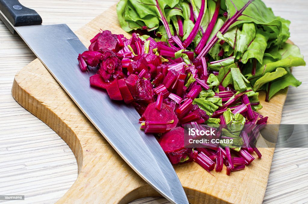 Cutted chard on the board Cutted chard on the wooden board ready to soup making Agriculture Stock Photo