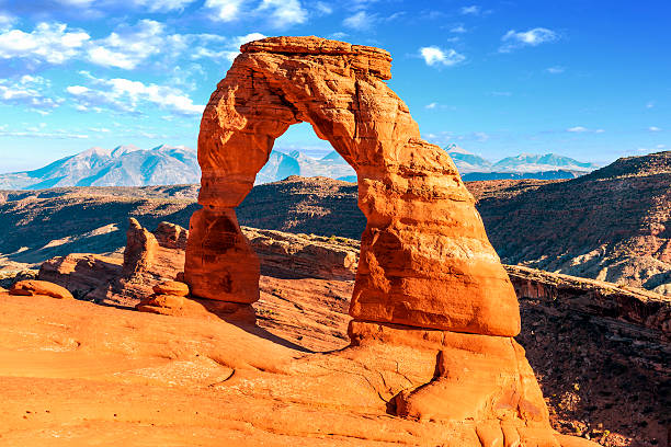 A view of Delicate Arch in Arches National Park in Utah Sunset at famous Delicate Arch, Utah, USA natural arch photos stock pictures, royalty-free photos & images