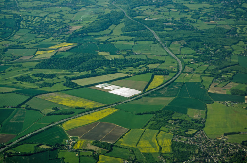 Aerial view of the M25 motorway as it passes through Kent, England.