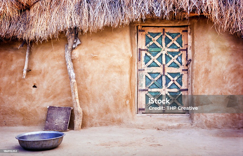 Village Hut Exterior of a village hut in the Great Thar Desert, India Mud Stock Photo