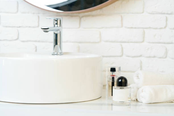 istock Perfume bottle in a modern bathroom close up 1869157010