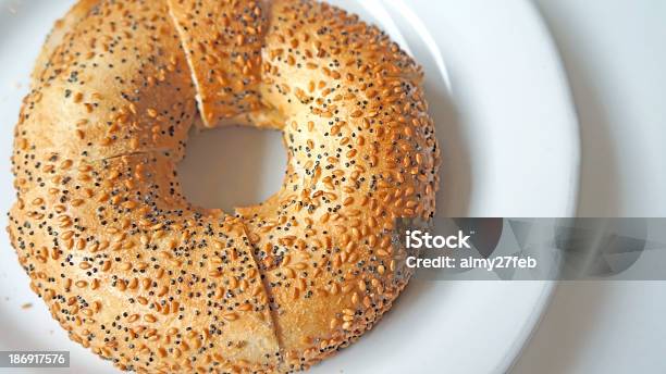Freshly Baked Bagel On A White Plate Stock Photo - Download Image Now - Bagel, Baked, Baked Pastry Item