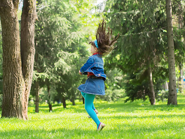 istock Happy girl at summer meadow 186917810
