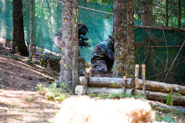 istock Paintball players running 186918028