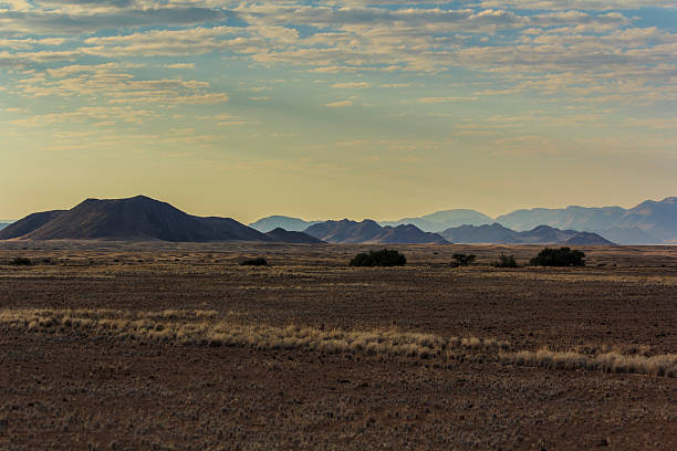 istock skies clearing over mountains 186918437