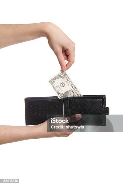 Mano Tirando Del Dólar Por Bolso Isolaetd Foto de stock y más banco de imágenes de Abundancia - Abundancia, Adulto, Agarrar