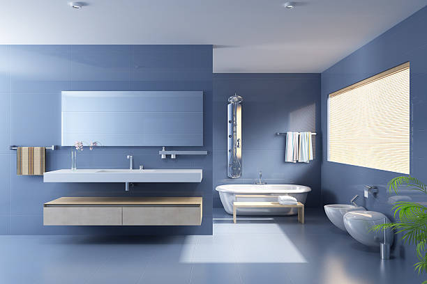Blue bathroom with modern upgrades stock photo