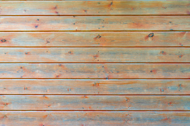 istock Old wooden planks with peeling paint. 1869207621