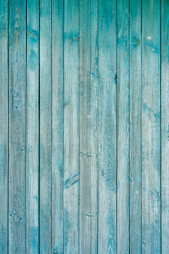 Old wooden planks with peeling paint. Vintage wood texture.