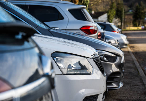 istock a row of parked cars 1869208128