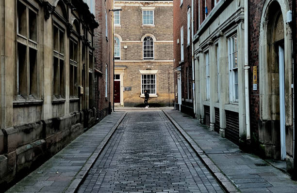 View of pedestrian walking on New Street in Leicester. November 2022