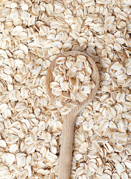 flocos de aveia - oat whole wheat cereal plant oat flake imagens e fotografias de stock