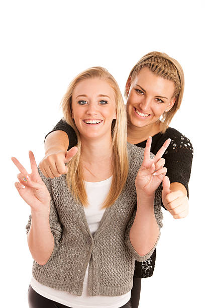 istock Two beautiful women gesturing success 186921956