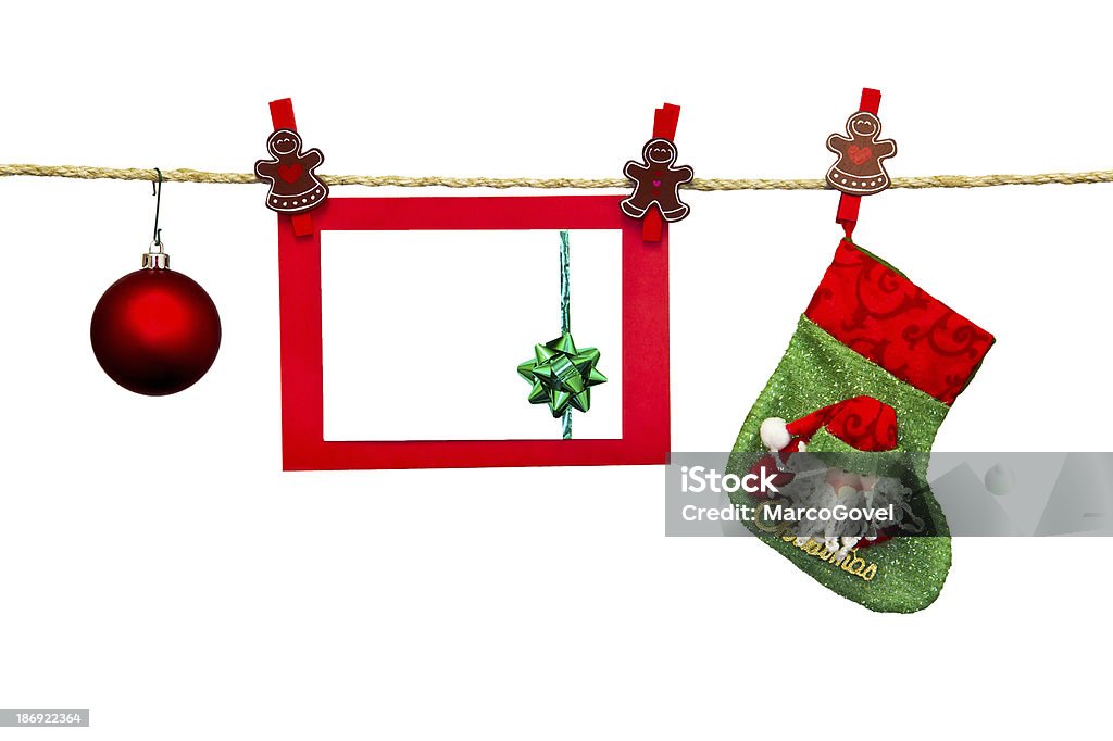 christmas card christmas card in clothesline isolated on white Blank Stock Photo