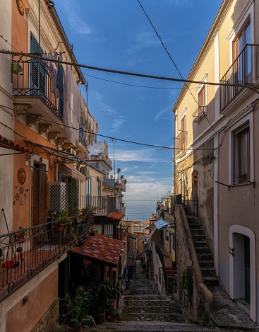 Pizzo, Italy - 13 December, 2023: view of a narrow village street in Pizzo Calabro in typical Italian shabby chic style