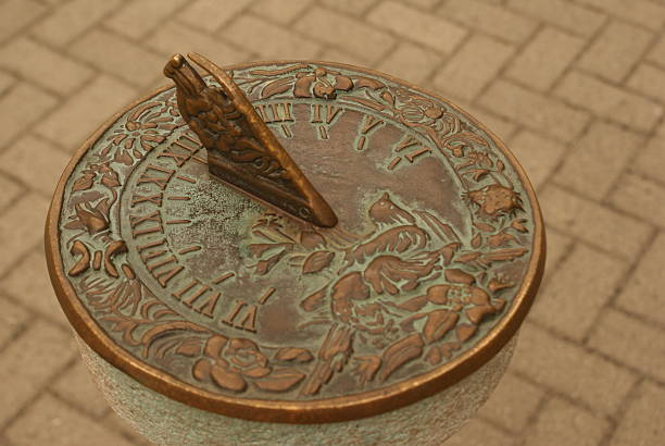istock Old Sun Dial in a Court Yard 186923359