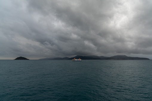 Portoferraio, Italy - 12 November, 2023: a BluNavy ferry travelling from Elba Island to the Italian mainland