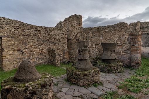 Pompei, Italy - 25 November, 2023: traditional storage pots among the ruins of the ancient city of Pompeii