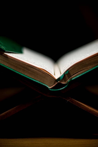 istock pages of holy koran the testament 186926392
