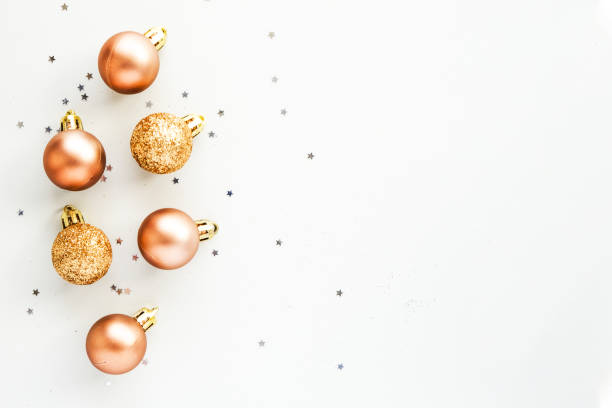 istock Christmas composition. Christmas tree glittering balls on a monochrome background. View from above. 1869273894