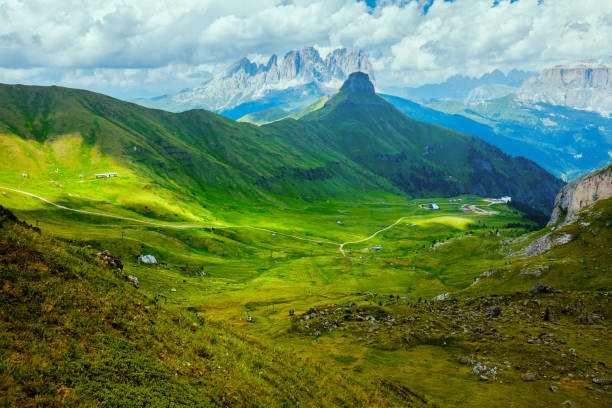 istock landscape with mountains, hills and clouds 1869277622