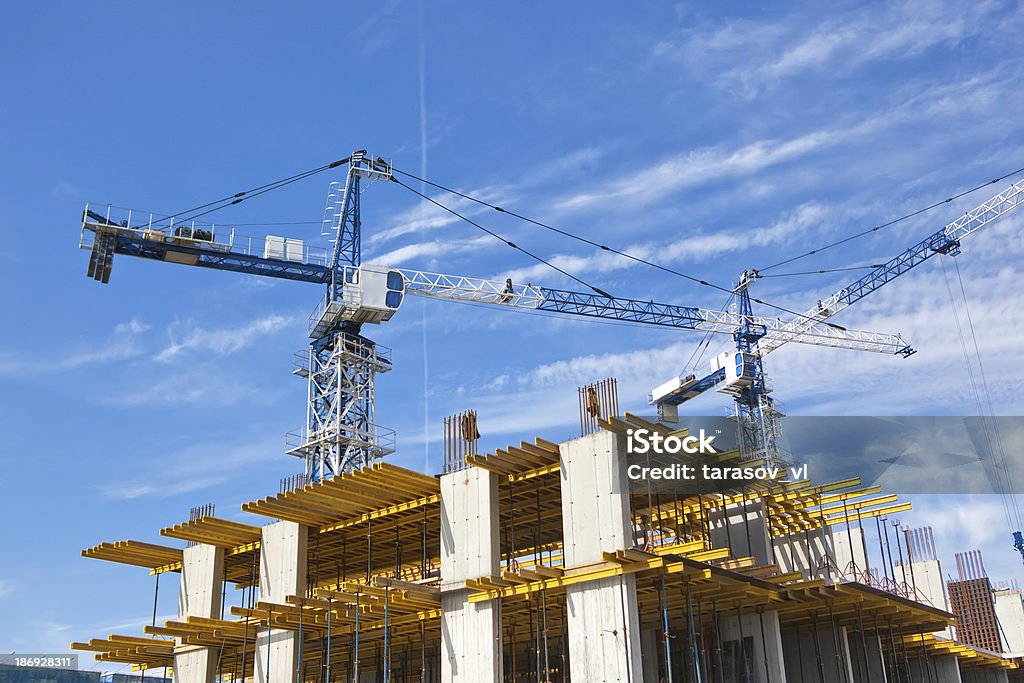 construction site with tower cranes Apartment Stock Photo