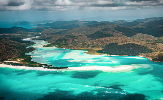 The aerial view of the Whitheaven Beach and Whitsunday Island from scenic helicopter
