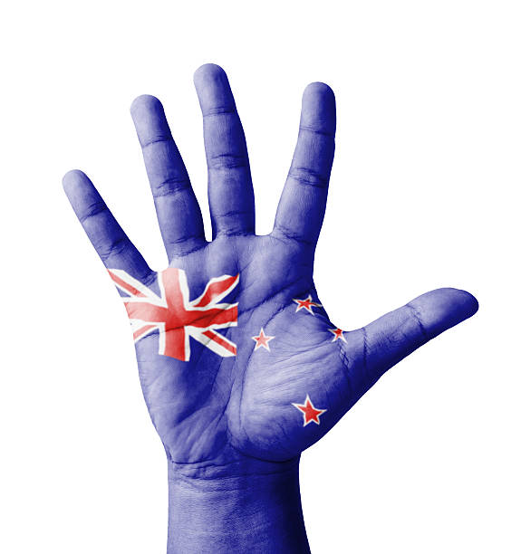istock Open hand raised, multi purpose concept, New Zealand flag painted 186929257