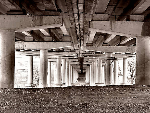 istock bottom view of a concrete bridge in grunge style 186929340