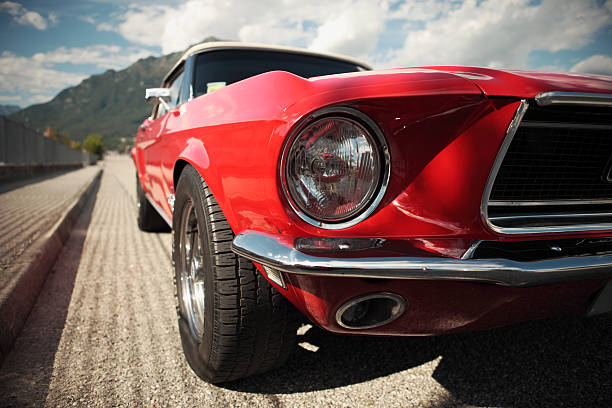 Classic Muscle Car American muscle car convertible on the road, cropped image sports car photos stock pictures, royalty-free photos & images