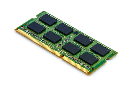 Close-up green DDR RAM (Double Data Rate Random Access Memory) stick on isolated background