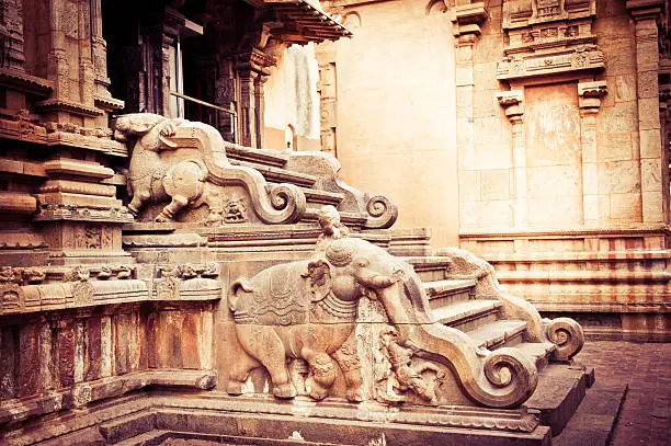Amazing stone bas relief on stepladder of main tower at Hindu Brihadishvara Temple. South India, Tamil Nadu, Thanjavur (Trichy)