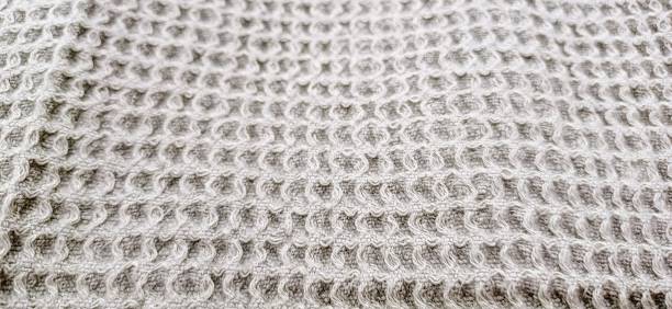 istock Cream color knitwear weaving 1869312814