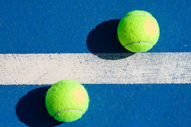 istock Isolated tennis balls 186931309