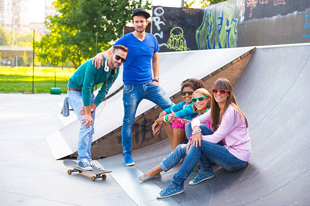 istock Young people having fun at the skatepark 186932137