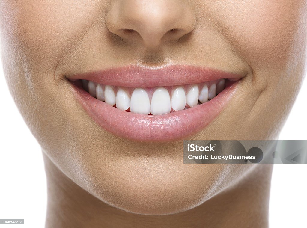 closeup of smile with white teeth closeup of smile with white heatlhy teeth Smiling Stock Photo