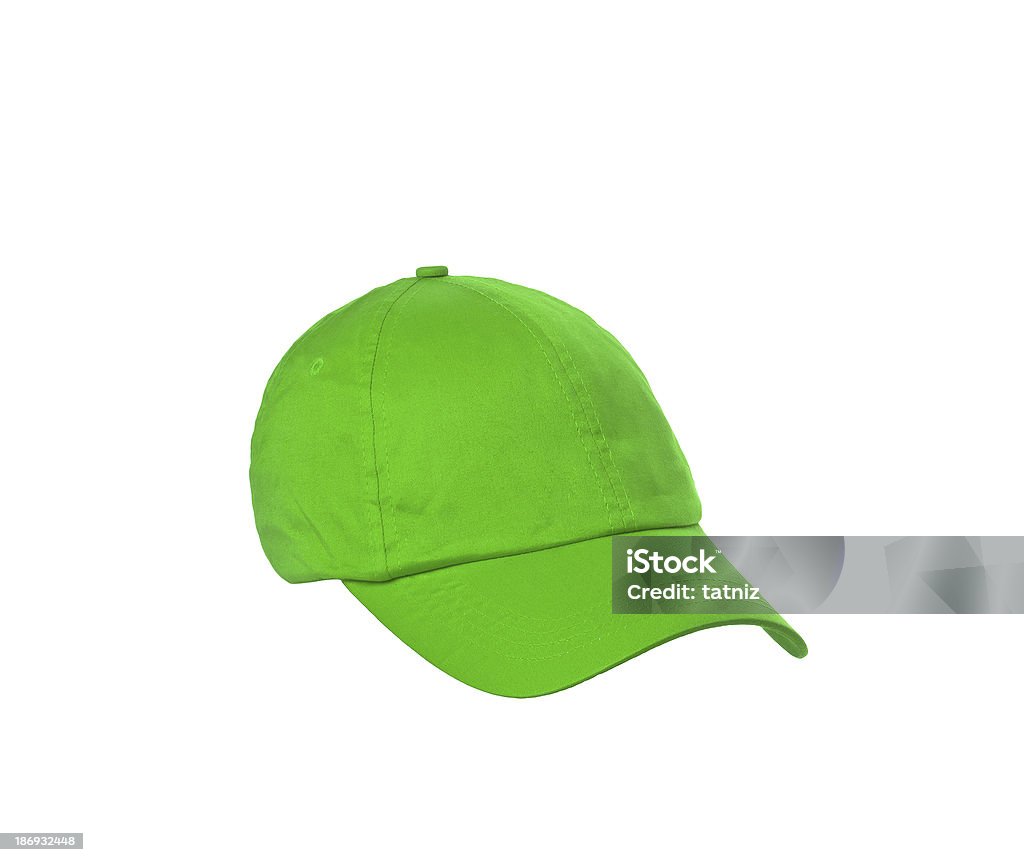 Verde cappellino da baseball è isolato su un bianco - Foto stock royalty-free di Abbigliamento