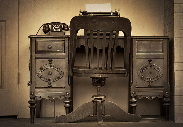 istock vintage desk with telephone 186933511