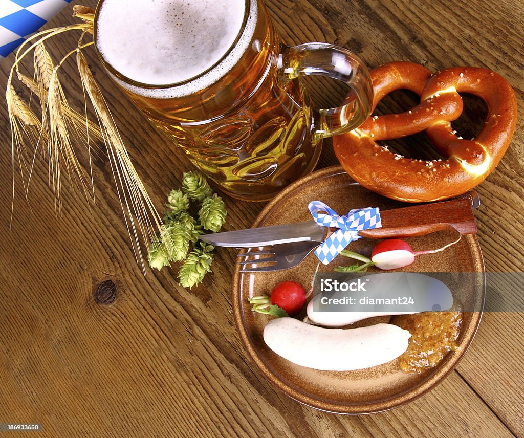 Beer Fest menu with beer, white sausage, pretzel and radish Beer Fest menu - beer, white sausage, pretzel and radish, top view Autumn Stock Photo