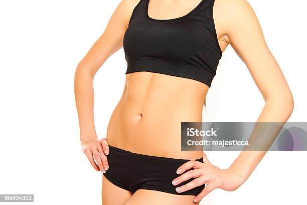 Schmale Gebräunten Weiblichen Körper Isoliert Auf Weißem Hintergrund Stockfoto und mehr Bilder von Abnehmen