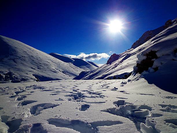 White mountains,Crete,Greece FOOTSTEPS IN THE SNOW IN CHANIAS WHITE MOUNTAINS,CRETE,GREECE lefka ori photos stock pictures, royalty-free photos & images