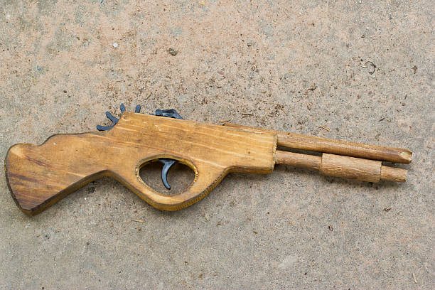 istock wood gun , toy 186939017