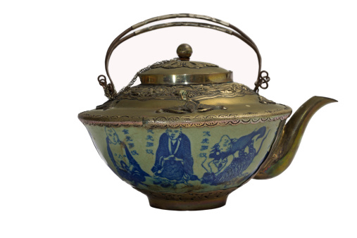 Beautiful ornate tea set kettle and cups with gold leaf design