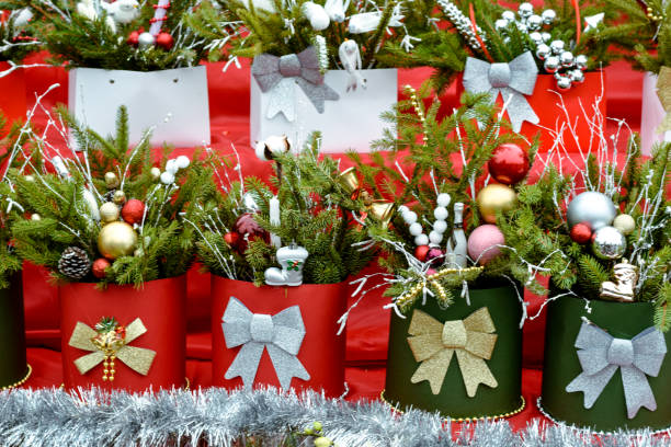 Christmas bouquets with fir branches decorated with globes for gift