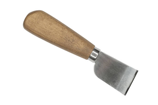 istock A leather cutting knife for manual work on leather with a handle made of light wood is isolated on white background. 1869452091