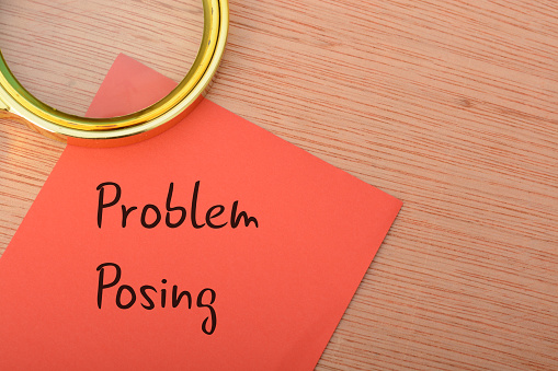 Problem posing refers to the process of formulating or creating new problems or questions based on existing knowledge or situations. It is a critical aspect of learning and involves individuals or students