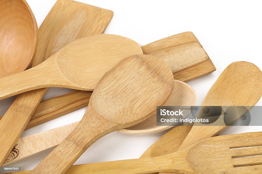 Wooden kitchen utensils. Wooden kitchen utensils. Isolated on a white background. Baking Stock Photo