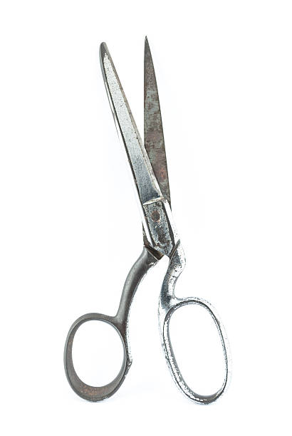 istock Old and retro fashioned sewing scissors isolated on white 186947206